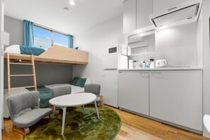 Klassiek appartement, 1 slaapkamer, niet-roken | Verduisterende gordijnen, een strijkplank/strijkijzer, gratis wifi