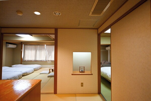 Perhehuone | Tallelokero huoneessa, ilmainen Wi-Fi