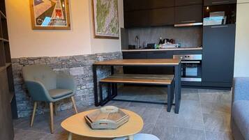 Apartment | Private kitchen | Highchair, cleaning supplies