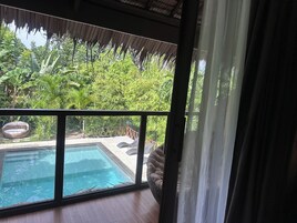 Deluxe Room, Pool View | Desk, laptop workspace, blackout drapes, free WiFi
