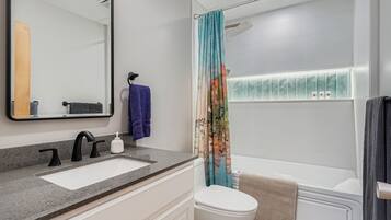 Jetted tub, hair dryer, towels, soap