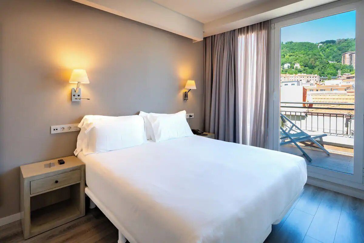 Wake up to sunshine and step out to balcony views.