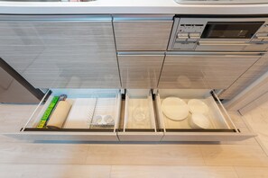 Fridge, microwave, stovetop, cookware/dishes/utensils