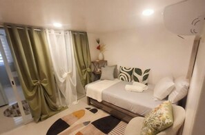 Condo, 1 Bedroom, Smoking, Terrace | Living room - Prime World District Condo (Lapu-Lapu)