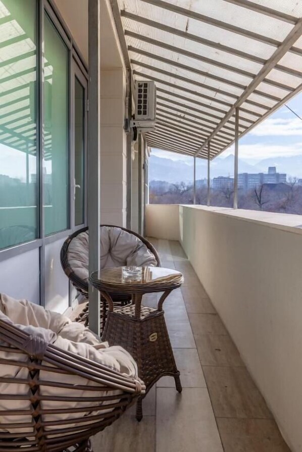 Suite, Balcony, City View | Terrace/patio