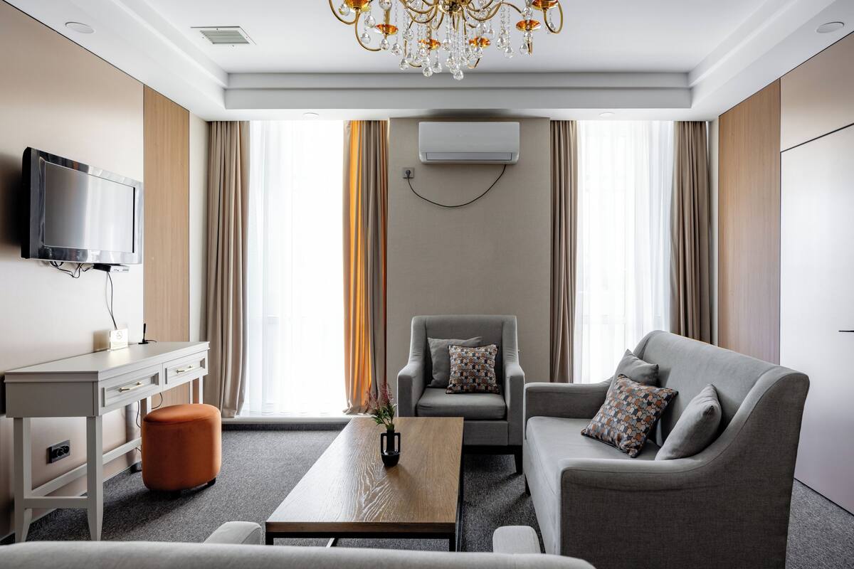 Suite, Balcony, City View | In-room safe, soundproofing, iron/ironing board, WiFi (free)