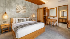 Une chambre moderne avec un grand lit, une armoire en bois et un bureau avec une chaise.