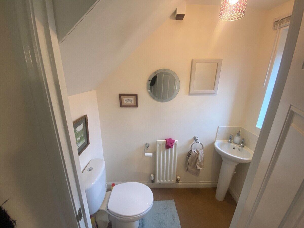 Shower, hair dryer, towels, toilet paper