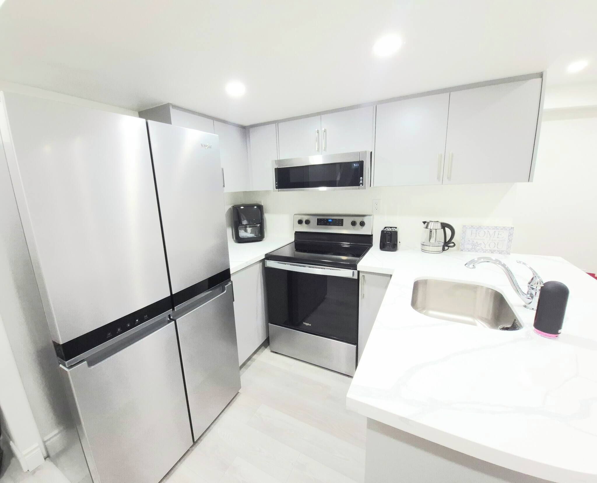 Fridge, microwave, coffee/tea maker, toaster