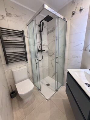 Hair dryer, towels, toilet paper