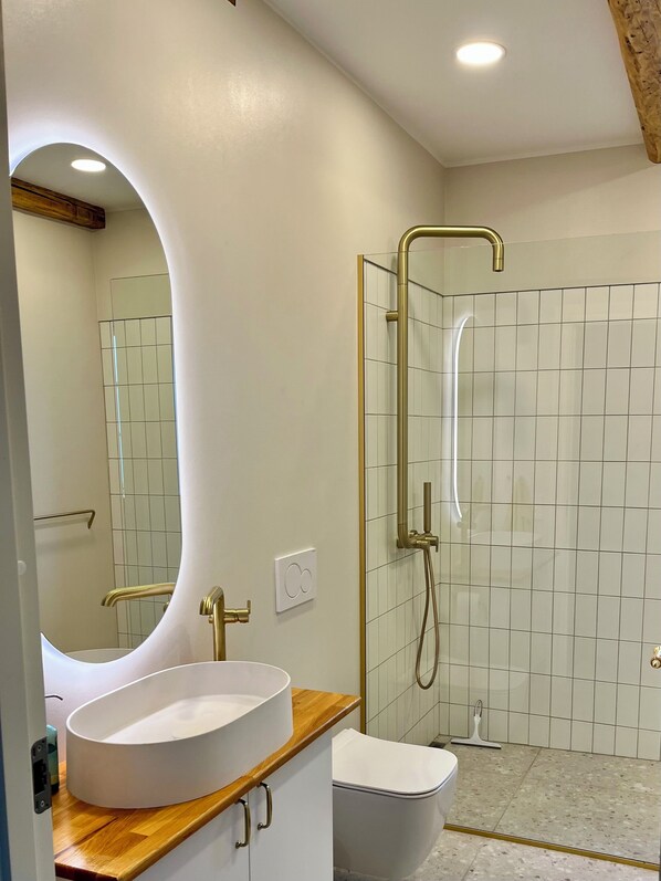 Shower, hair dryer, towels, soap