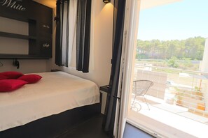 1 dormitorio, tabla de planchar con plancha, cuna de viaje y wifi gratis