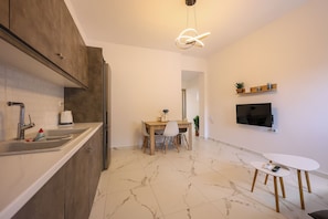 Apartment, 1 Bedroom | Living area | Flat-screen TV - Aerial Apartments (Karterádos)