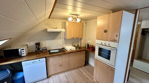 Apartment | Private kitchen | Highchair - Spacious Spot by the Hiking Trails (Mont-Dore)