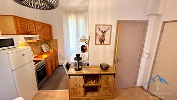 Apartamento | Cocina privada | Trona infantil
