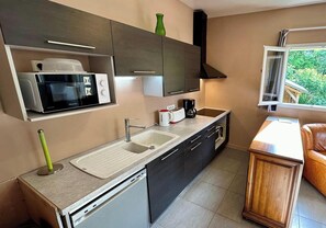 Appartement | Cuisine privée | Chaise haute