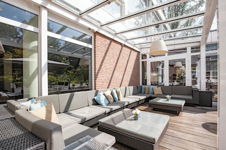 Terrace/patio. Relaxing Stay with Free Parking, Scenic Garden & Sun Deck to Unwind
