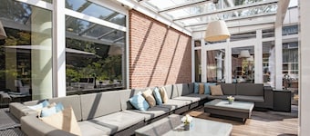 Relax and Unwind on the Garden Terrace, with Golf Nearby and Free Parking