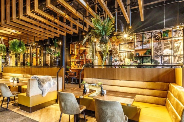 Unwind over cocktails in a lively, design-forward dining lounge