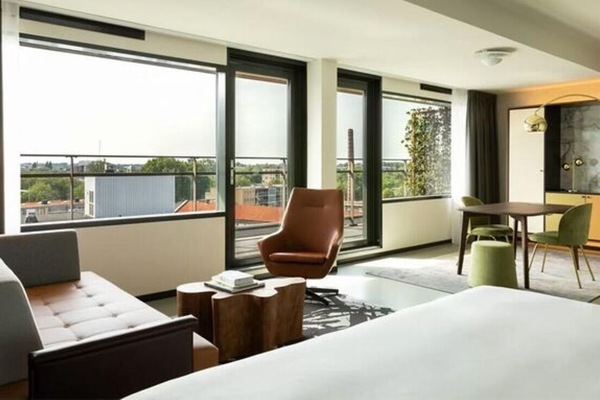 Wake up to panoramic views from a sunlit, spacious king bed.