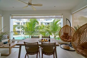 Outdoor dining - Luxury Beachfront 2BR Retreat | AquaEsmeralda (Dominicus)