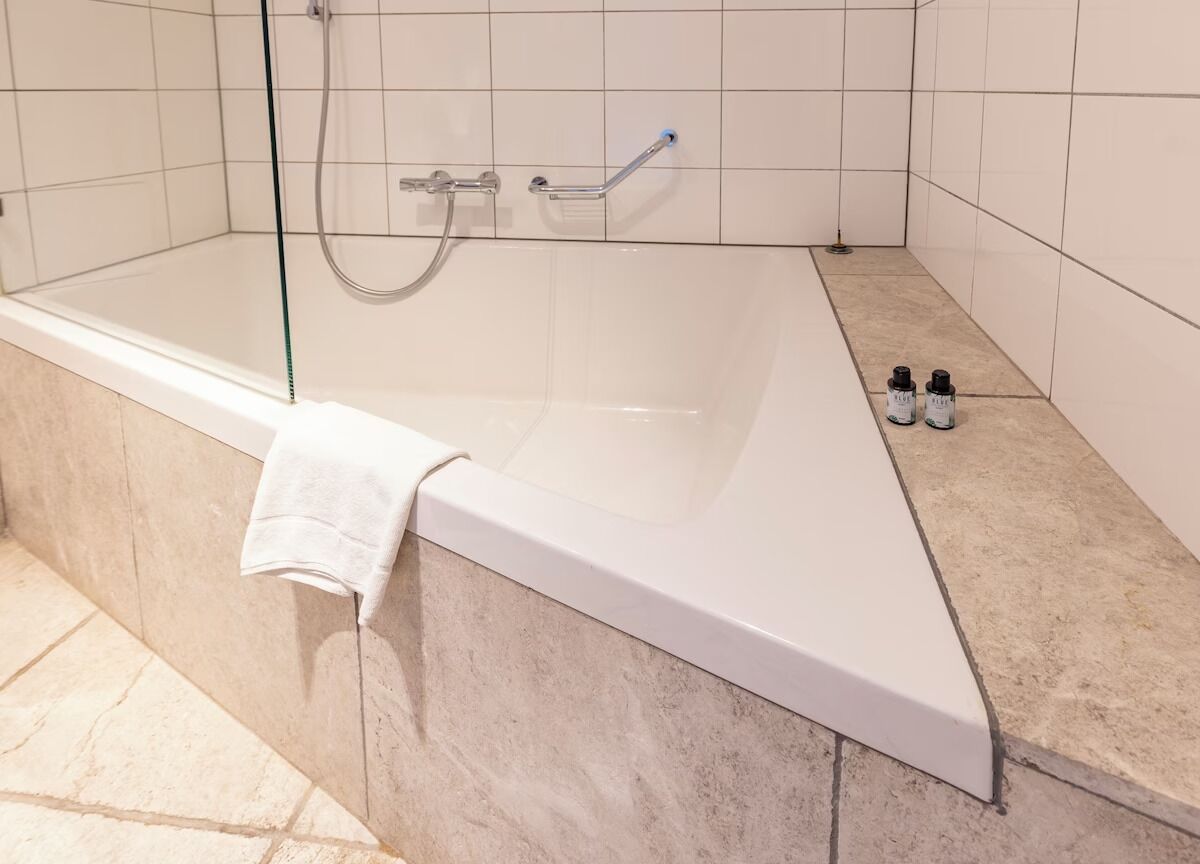 Soak away the day in a deep tub with bath amenities