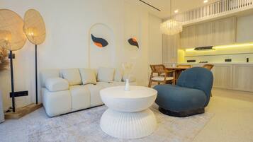 Superior Apartment, Poolside | Living area