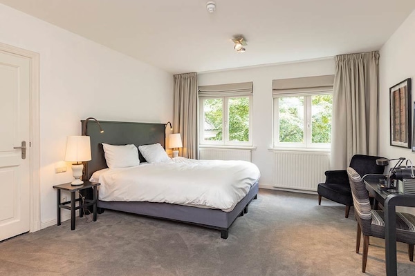 Stretch out in a bright room with space to work.