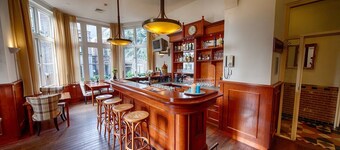 Relax in a Non-Smoking Room with Courtyard, Garden & On-Site Bar in Deventer