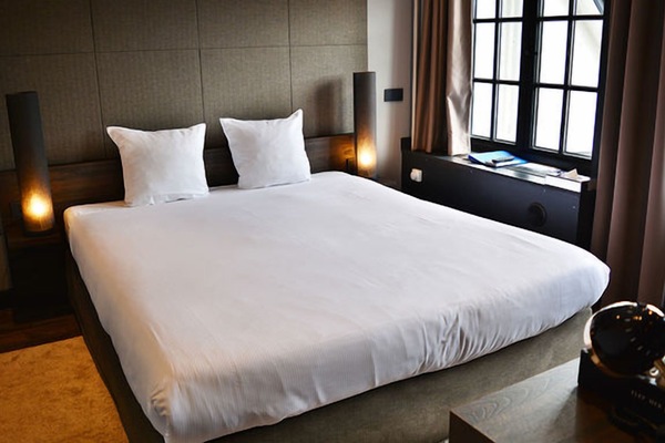 Sink into crisp linens for a deeply restful night.