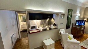 Apartment | Private kitchen | High chair - Nature Refuge Near the Trail (Mont-Dore)