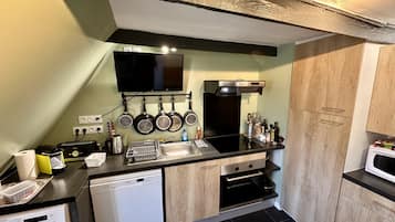 Appartement | Privékeuken | Een kinderstoel