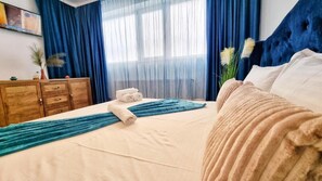 Appartement, 2 slaapkamers | Een strijkplank/strijkijzer, gratis wifi