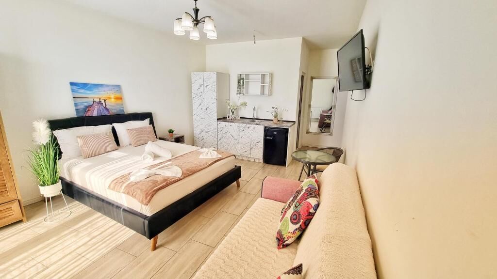 Superior Studio, Balcony, City View | Iron/ironing board, free WiFi