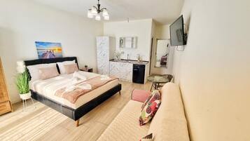 Superior Studio, Balcony, City View | Iron/ironing board, free WiFi