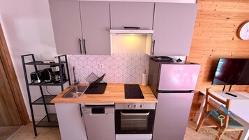 Apartamento | Cozinha privada | Cadeirão de bebê