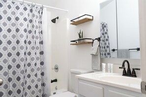 Hair dryer, towels, soap, toilet paper