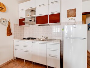 Apartment | Private kitchen - With Beachfront Terrace and air Conditioning (Castelsardo)