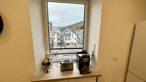 Apartamento | Cocina privada | Trona infantil