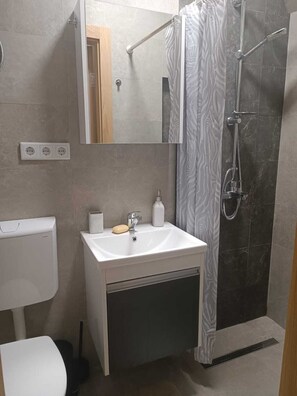 Shower, hair dryer, towels, soap - DIVNA APARTMENTS SARAJEVO GRBAVICA 
Modern, Business District, Embassies (Sarajevo)