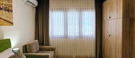 1 habitación, tabla de planchar con plancha, wifi y ropa de cama