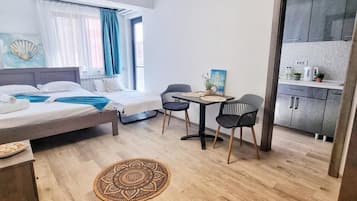 Estúdio família, sacada, vista para a cidade