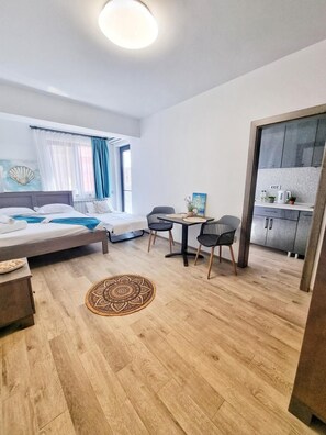 Estúdio família, sacada, vista para a cidade