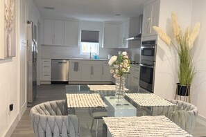 Fridge, microwave, oven, stovetop - Stillwater Haus – Waterfront Home w/ Dock & Intracoastal Access (Largo)