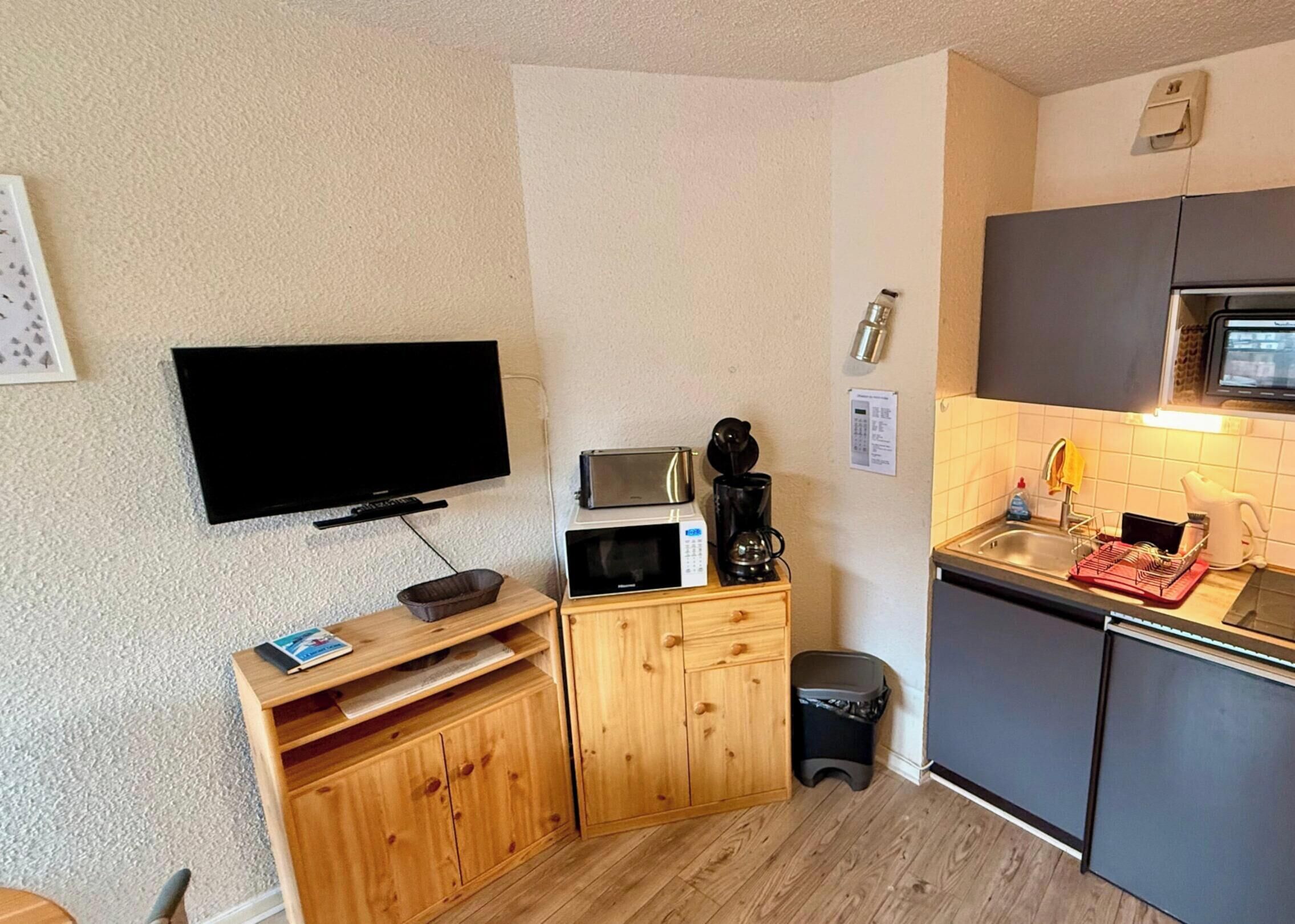 Apartamento | Cozinha privada | Cadeirão de bebê