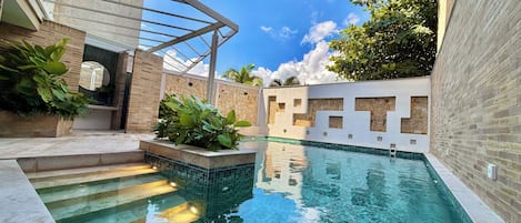 Outdoor pool, pool umbrellas, pool loungers