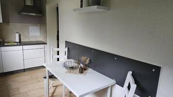Appartement, uitzicht op tuin | Dineren