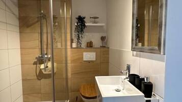 Appartement, uitzicht op tuin | Badkamer