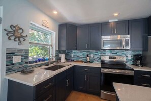 Fridge, microwave, oven, stovetop - Gulf Access Home | Private Dock | Tarpon Fishing (Saint James City)