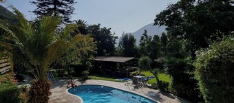 Casa California surrounded by greenery and colors, pool, jacuzzis, sauna and gardens!